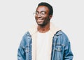 Portrait happy smiling african man looking away wearing an eyeglasses on a gray background Royalty Free Stock Photo