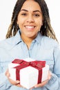 Portrait of a happy smiling afro woman holding present box boxes isolated over white background Close up Royalty Free Stock Photo