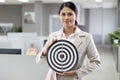 Portrait happy smiling Asian woman officer worker standing and holding dart board at office, confident attractive female beautiful Royalty Free Stock Photo