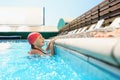 The portrait of happy smiling beautiful teen girl at the pool Royalty Free Stock Photo