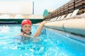 The portrait of happy smiling beautiful teen girl at the pool Royalty Free Stock Photo