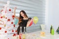 Portrait of happy and smiling beautiful young asian woman in christmas party with food and drink  and color full balloon party Royalty Free Stock Photo