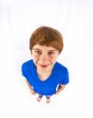 Portrait of happy smiling boy with blue shirt Royalty Free Stock Photo