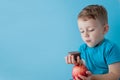 Portrait happy, smiling boy choosing junk food. Healthy versus unhealthy food. Healthy vs unhealthy eating, teenager Royalty Free Stock Photo