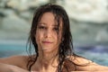 portrait of a  happy smiling brunette wet woman at the spa wellness pool Royalty Free Stock Photo