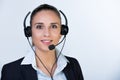 Portrait of happy smiling cheerful support phone operator in headset, isolated on white background Royalty Free Stock Photo