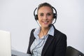 Portrait of happy smiling cheerful support phone operator in headset, isolated on white background Royalty Free Stock Photo