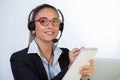 Portrait of happy smiling cheerful support phone operator in headset, on white background Royalty Free Stock Photo