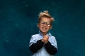 Portrait of happy smiling child with eyeglasses