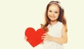 Portrait happy smiling child holding big red paper heart on a white background Royalty Free Stock Photo