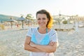 Portrait of happy smiling confident middle aged woman on beach Royalty Free Stock Photo