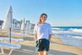 Portrait of happy smiling confident middle aged woman on beach Royalty Free Stock Photo