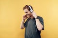 Portrait of Happy Smiling Guy Listening to Music Royalty Free Stock Photo