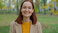 Portrait happy smiling laughing positive carefree cheerful glad woman Caucasian girl lady female in autumn park laugh Royalty Free Stock Photo