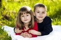 Portrait of happy smiling little children boy and girl on sunny Royalty Free Stock Photo