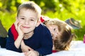 Portrait of happy smiling little children boy and girl on sunny Royalty Free Stock Photo