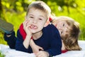 Portrait of happy smiling little children boy and girl on sunny Royalty Free Stock Photo