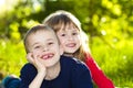 Portrait of happy smiling little children boy and girl on sunny Royalty Free Stock Photo