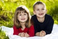 Portrait of happy smiling little children boy and girl on sunny Royalty Free Stock Photo