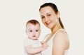 Portrait of happy smiling mother with her cute baby over white background Royalty Free Stock Photo