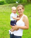Portrait of happy smiling mother and son child outdoors Royalty Free Stock Photo