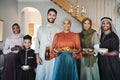 Portrait of a happy, smiling and positive muslim family celebrating Ramadan together, spending the day embracing