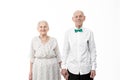 Portrait of happy, smiling, romantic senior man with his wife, old woman in white dress and old man in white shirt Royalty Free Stock Photo