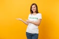 Portrait of happy smiling satisfied woman in white t-shirt with written inscription green title volunteer isolated on Royalty Free Stock Photo
