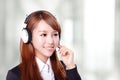 Portrait of happy smiling support phone operator in headset Royalty Free Stock Photo