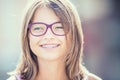 Portrait of a happy smiling teenage girl with dental braces and Royalty Free Stock Photo