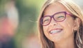 Portrait of a happy smiling teenage girl with dental braces and Royalty Free Stock Photo