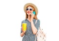 Portrait of happy smiling woman calling on smartphone with cup of juice wearing straw hat, backpack isolated on white background Royalty Free Stock Photo