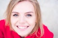 Portrait of a happy smiling woman, close up face of beautiful woman outdoor. Closeup teen with romantic smile. Cheerful Royalty Free Stock Photo