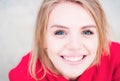 Portrait of a happy smiling woman, close up face of beautiful woman outdoor. Closeup teen with romantic smile. Cheerful Royalty Free Stock Photo