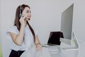 Portrait of happy smiling woman customer support phone operator at workplace Royalty Free Stock Photo