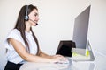 Portrait of happy smiling woman customer support phone operator at workplace Royalty Free Stock Photo