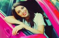 Portrait of happy smiling woman driver behind a wheel car Royalty Free Stock Photo