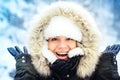 Portrait of happy, smiling woman, enjoying snow and winter days during cold season. Stylish portrait of beautiful woman Royalty Free Stock Photo