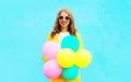 Portrait happy smiling woman holds an air balloons Royalty Free Stock Photo