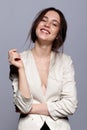 Portrait of happy smiling young brunette woman portrait in white Royalty Free Stock Photo