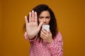 Portrait of a happy smiling young girl stalked and harassed in teenager cyber bullying concept Royalty Free Stock Photo