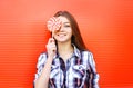 Portrait happy smiling young girl with sweet caramel lollipop having fun