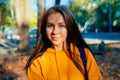 Portrait of a happy smiling young woman while walking outdoors Royalty Free Stock Photo