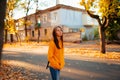 Portrait of a happy smiling young woman while walking outdoors Royalty Free Stock Photo