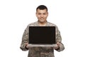 Hispanic Soldier showing laptop Royalty Free Stock Photo