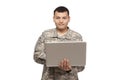 Soldier working on laptop computer Royalty Free Stock Photo