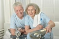 Portrait of happy sporty senior couple exercising Royalty Free Stock Photo