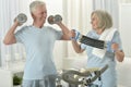 Portrait of happy sporty senior couple exercising Royalty Free Stock Photo