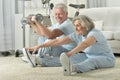 Portrait of happy sporty senior couple exercising Royalty Free Stock Photo