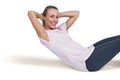 Portrait of happy sporty woman doing sit ups Royalty Free Stock Photo